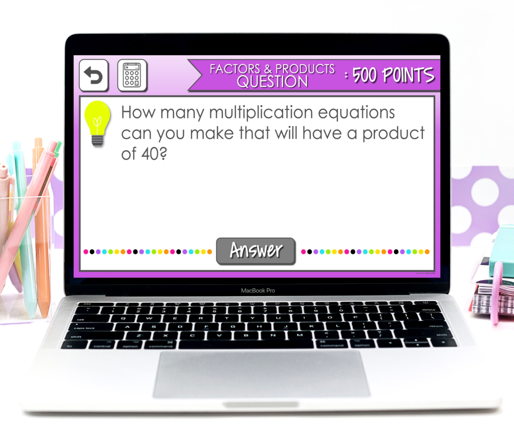 Interactive multiplication question on a laptop screen for 3rd grade students.